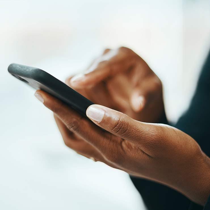 Woman texting on her mobile phone.